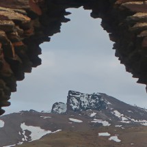 3396 meters high Pico del Veleta seen from the altar Virgen de las Nieves